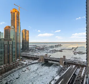 a view of city with tall buildings