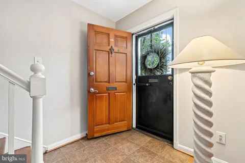 a view of entryway with a front door