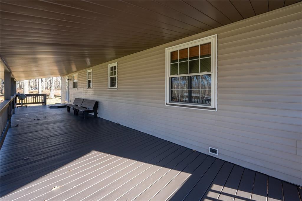 599 Laurel Summit Road Boswell, PA 15531 - Photo 13 of 35 a view of outdoor space with wooden floor and a yard