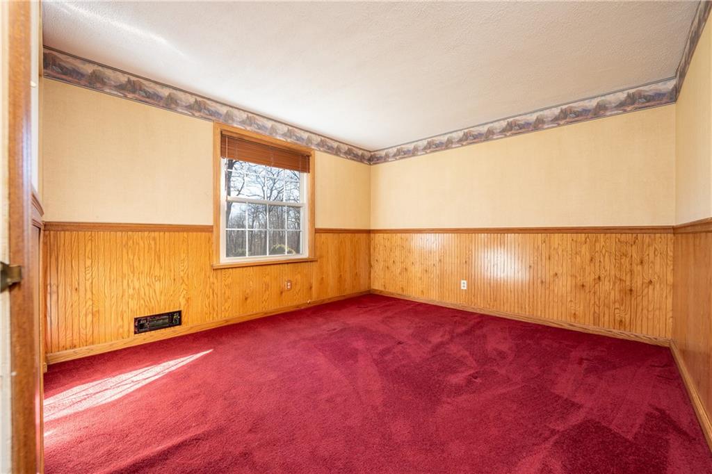 599 Laurel Summit Road Boswell, PA 15531 - Photo 16 of 35 a view of an empty room with a window and wooden floor