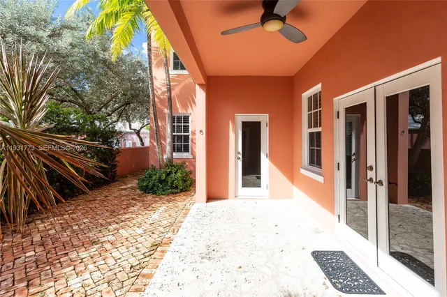 a view of a house with a barbeque