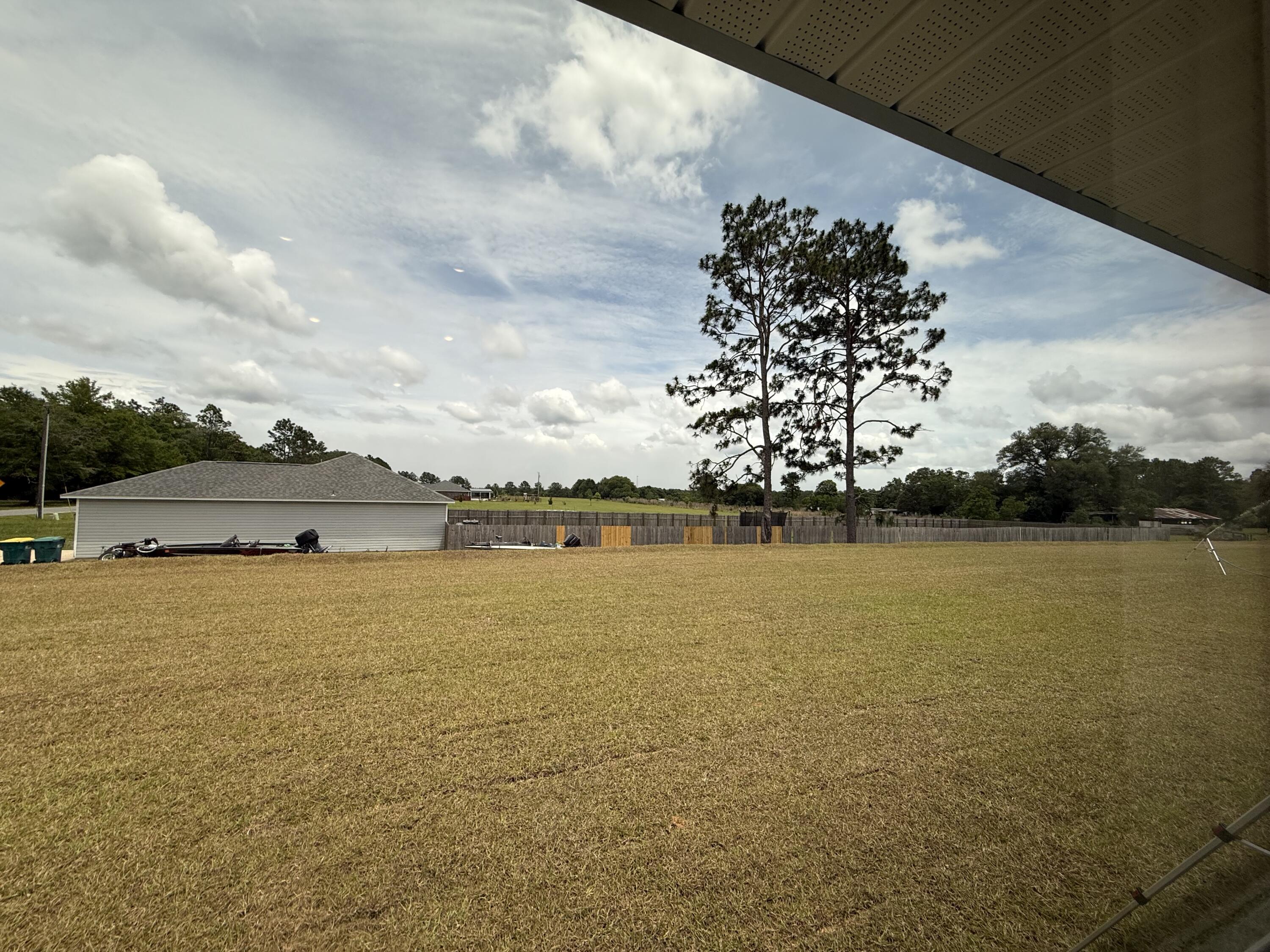 6000 Crocket Cove Crestview, FL 32539 - Photo 18 of 20 a view of an ocean and beach