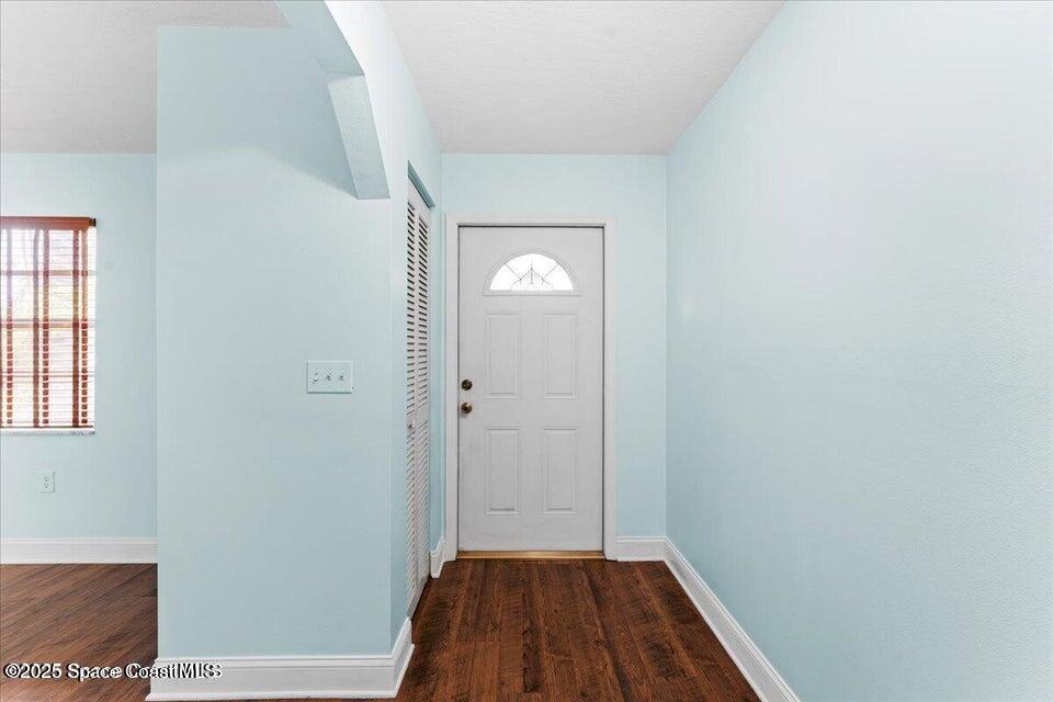 1527 Spruce Road Melbourne, FL 32935 - Photo 12 of 24 inside front foyer