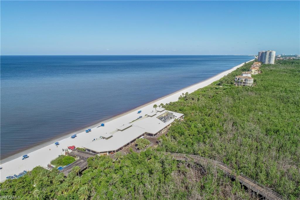 7117 Pelican Bay Boulevard, Unit 206 Naples, FL 34108 - Photo 34 of 35 an aerial view of a house