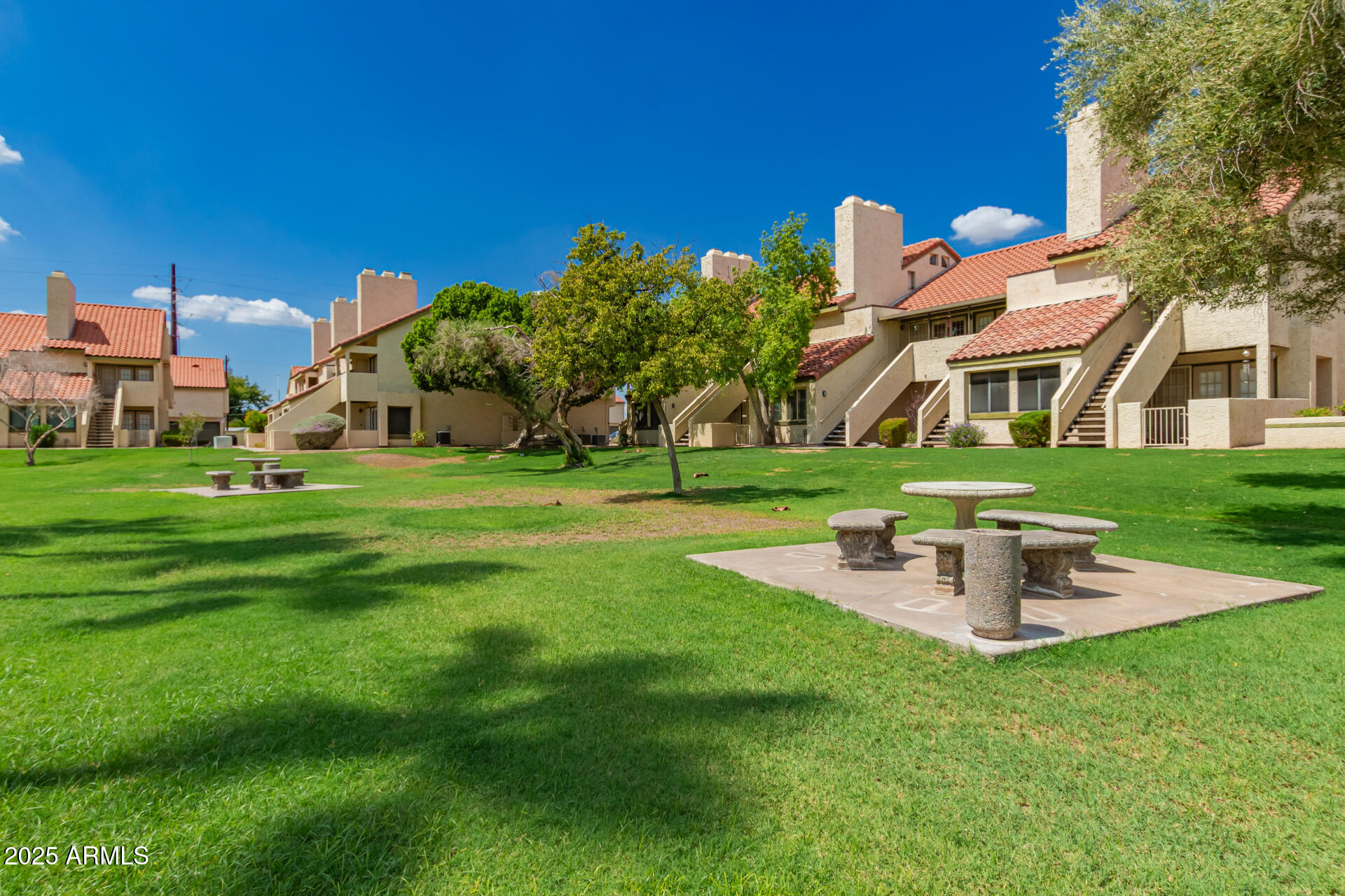 30 East Brown Road, Unit 2081 Mesa, AZ 85201 - Photo 18 of 19 a front view of a building with garden