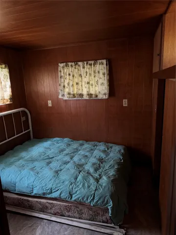 a view of balcony with furniture