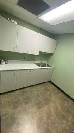 a living room with a sink