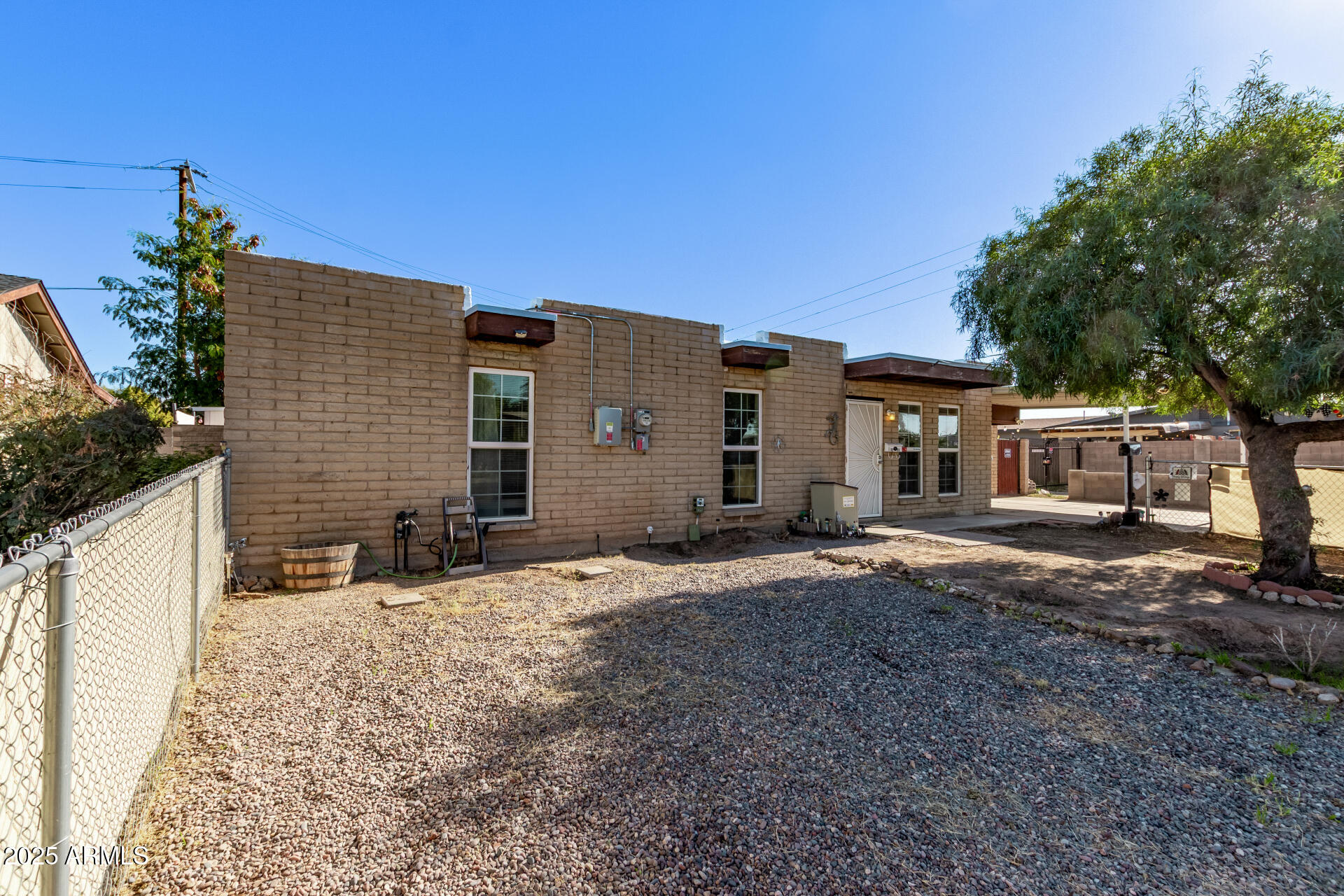 3251 West Cortez Avenue Phoenix, AZ 85029 - Photo 1 of 32 a view of a house with a yard
