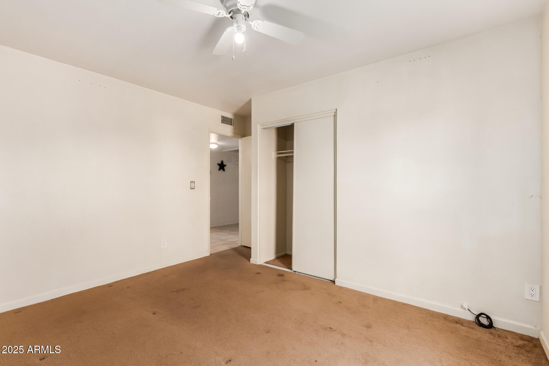 3251 West Cortez Avenue Phoenix, AZ 85029 - Photo 21 of 32 a view of a big room with chandelier fan and table