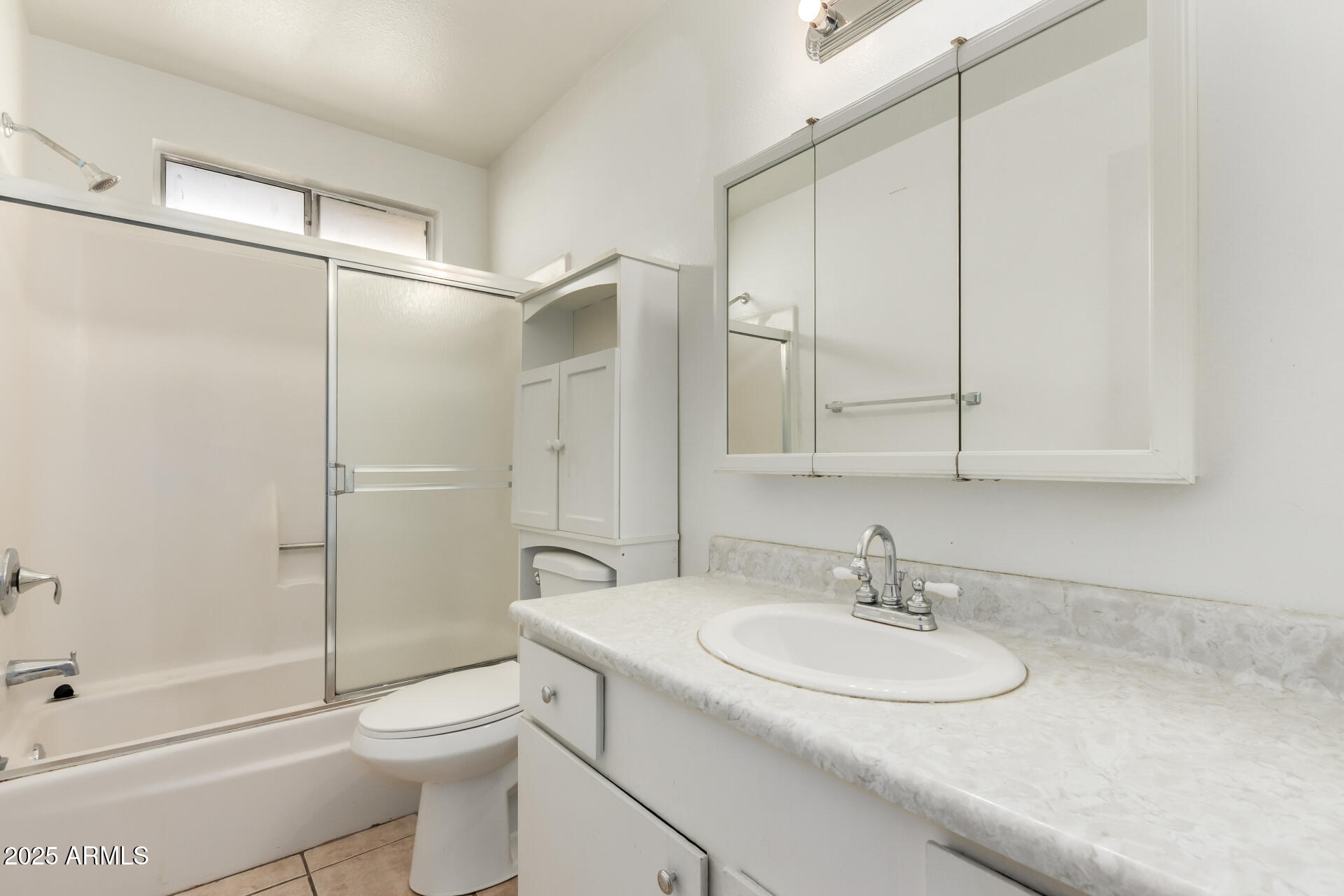 3251 West Cortez Avenue Phoenix, AZ 85029 - Photo 23 of 32 a bathroom with a sink toilet and shower
