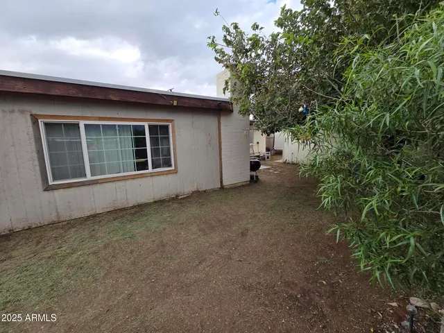 a house with trees in front of it