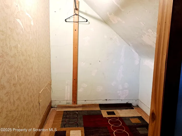 a room with furniture and flat screen tv