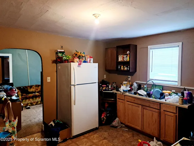 a childrens park with lots of swings and slides