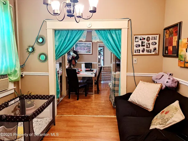 a room with lots of different colored cloths