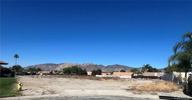 a view of a road with a building in the background