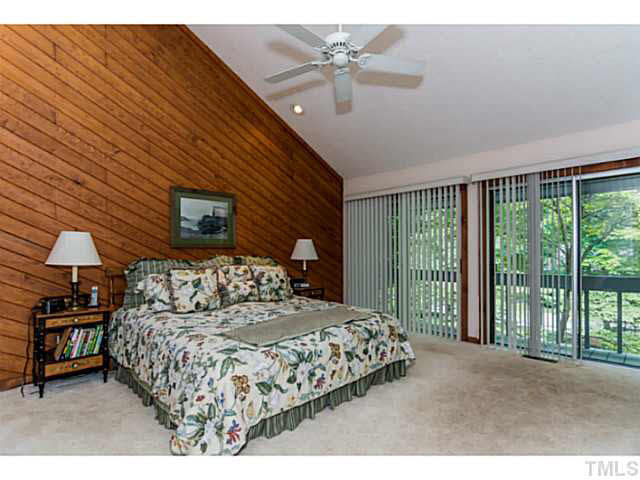 805 Queensferry Road Cary, NC 27511 - Photo 16 of 25 Master bedroom has cathedral ceiling. Opens up to balcony overlooking the front of the home. Master Bedroom