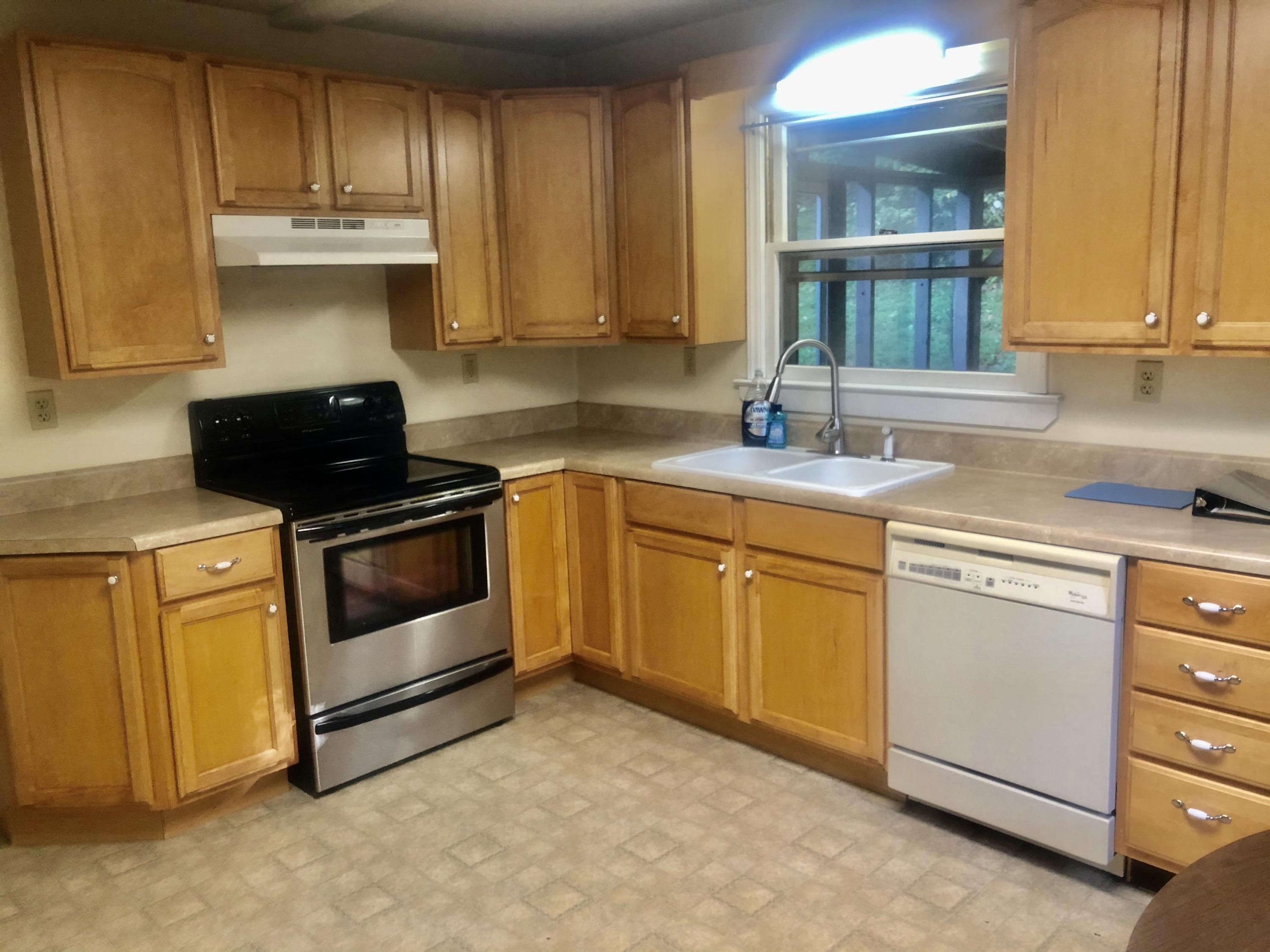 5453 Providence Church Road Ferrum, VA 24088 - Photo 3 of 16 a kitchen with appliances cabinets and a sink
