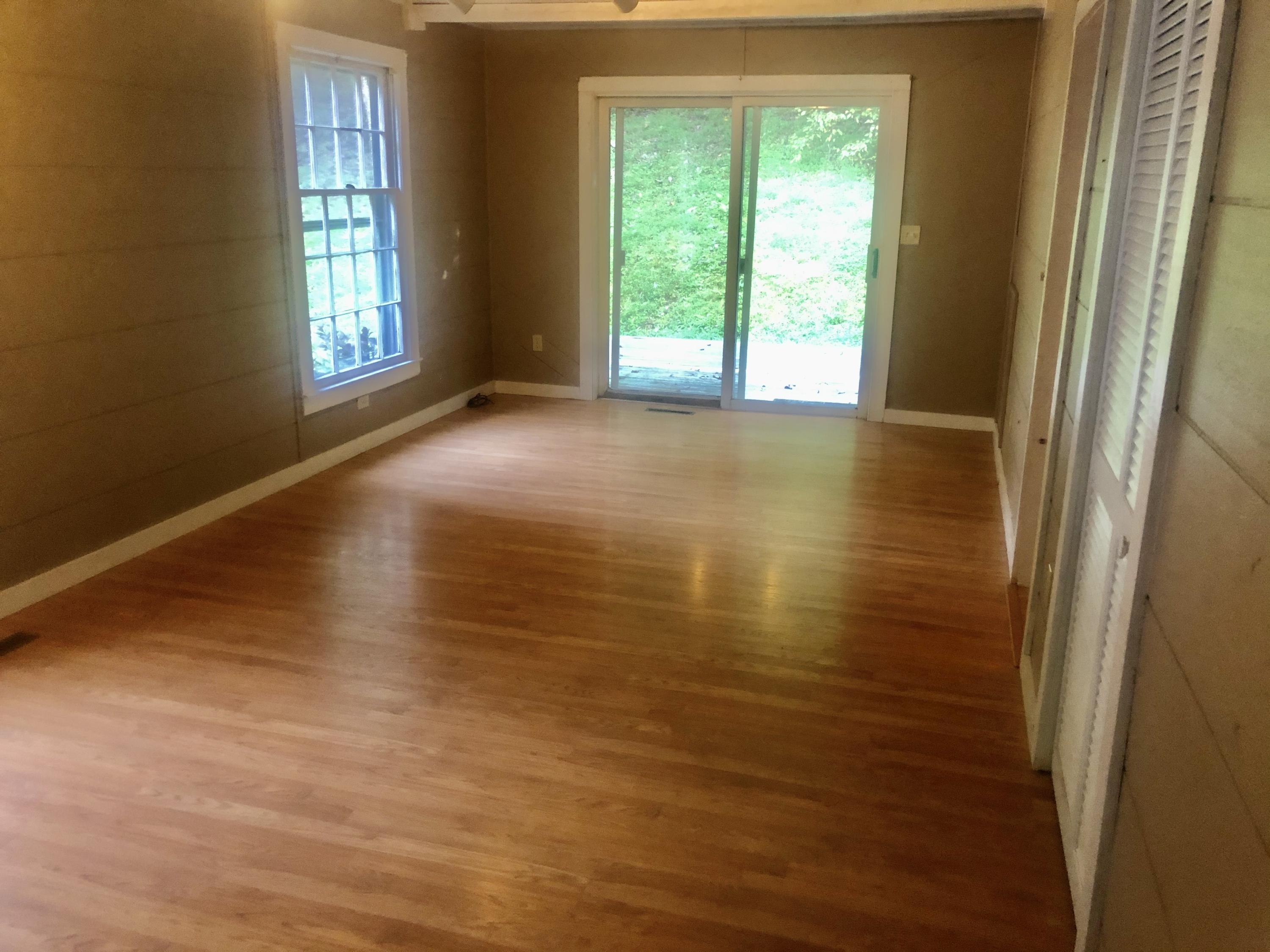 5453 Providence Church Road Ferrum, VA 24088 - Photo 4 of 16 a view of an empty room with a window