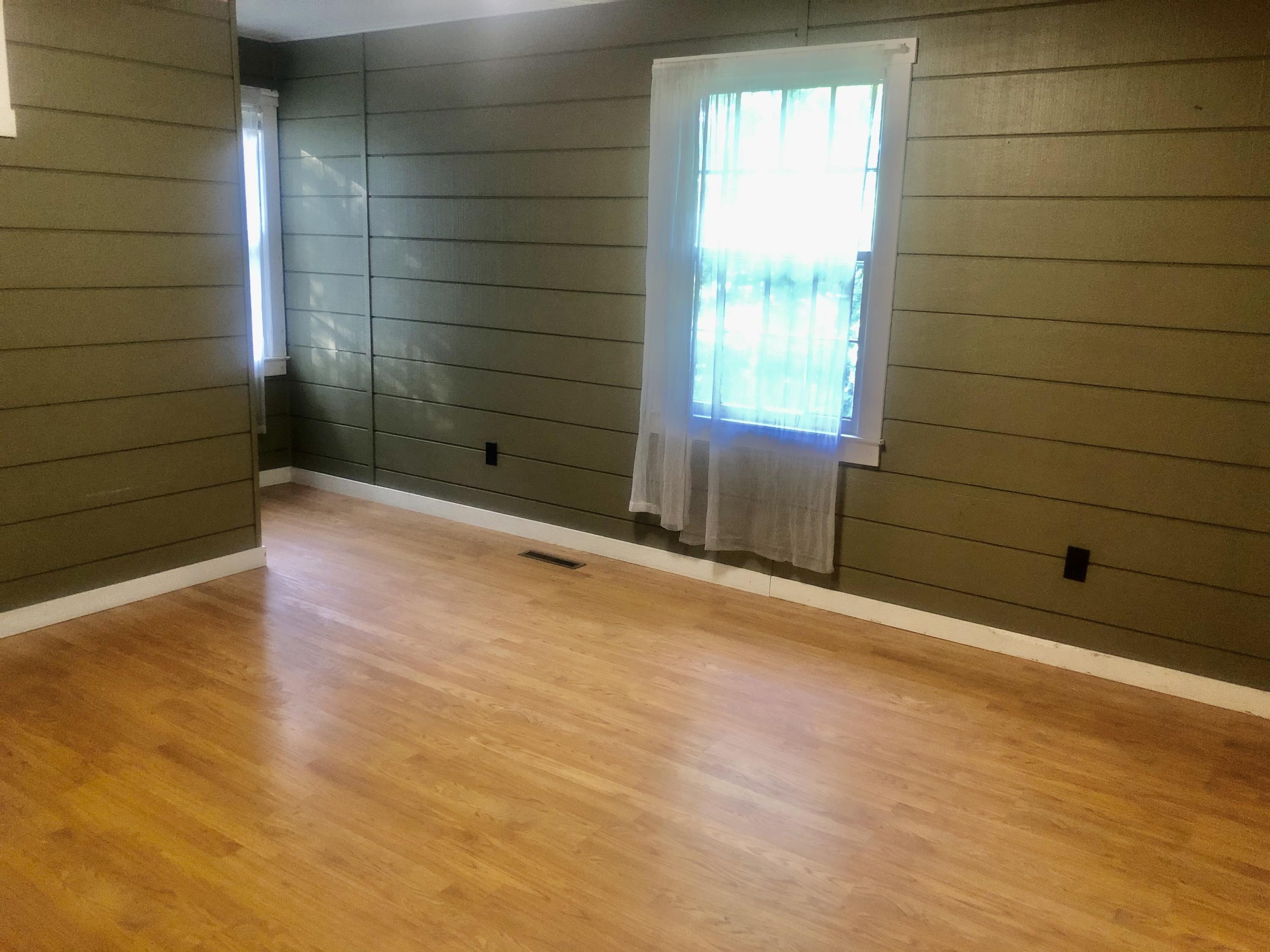5453 Providence Church Road Ferrum, VA 24088 - Photo 6 of 16 a view of an empty room with a window