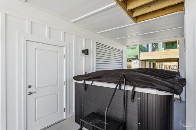 a kitchen with stainless steel appliances granite countertop a sink stove and wooden floor