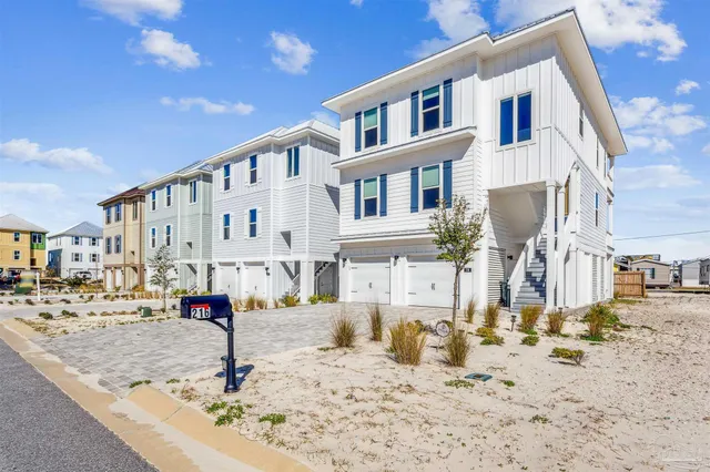 a front view of a house with a patio