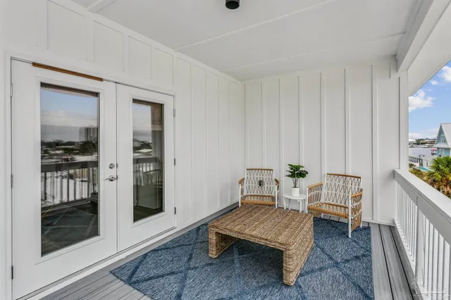 an aerial view of a house with a ocean view