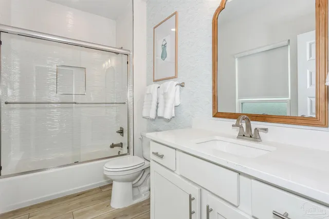 a view of a backyard with sitting area