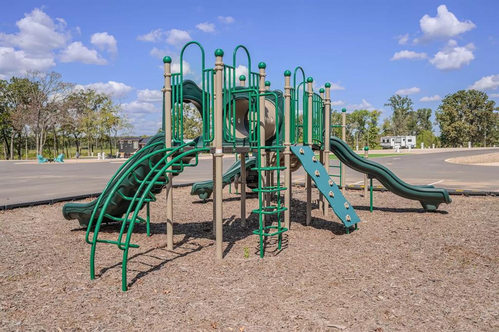 Lot 61 Rocco Dr Mount Mount Pleasant, TX 75455 - Photo 14 of 24 a view of a park with a slide