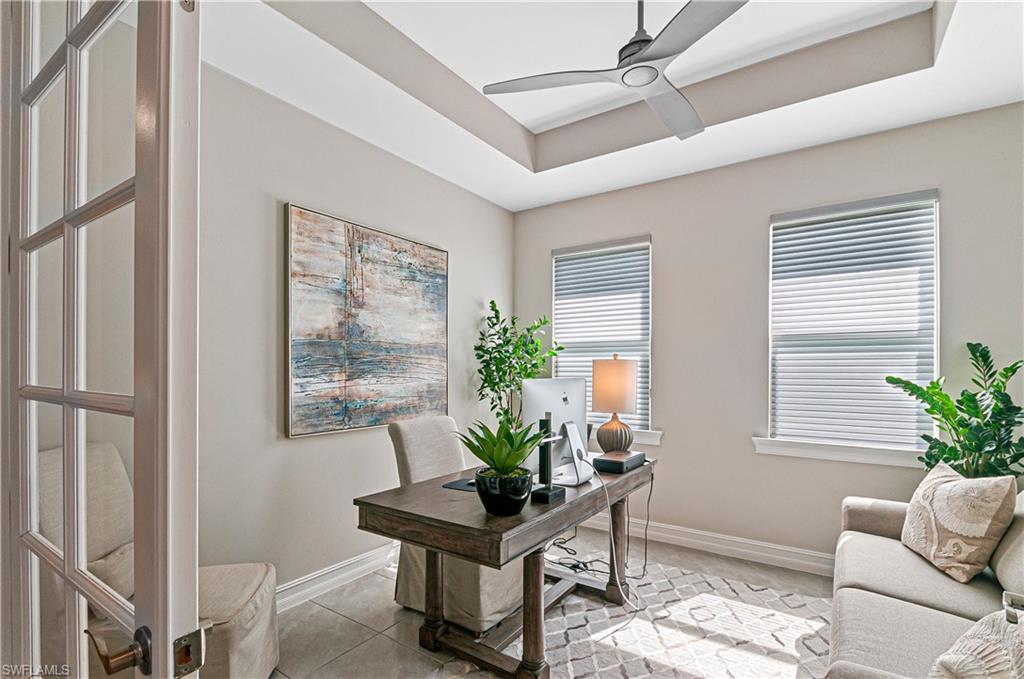 14506 Kelson Circle Naples, FL 34114 - Photo 11 of 25 a living room with furniture and a potted plant