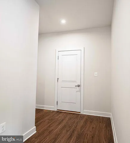 a bedroom with a bed and a cabinets
