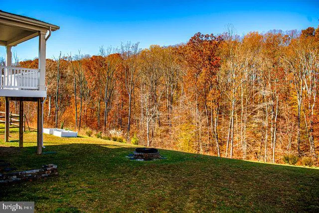 a view of a two chairs in the roof deck