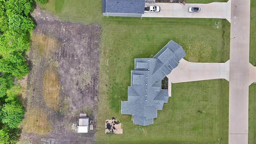 2223 Providence Way Nevada, TX 75173 - Photo 5 of 40 an aerial view of a house with a garden