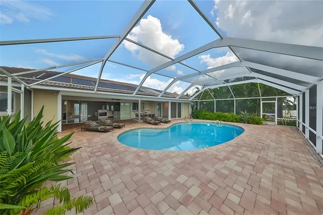 a view of swimming pool and deck