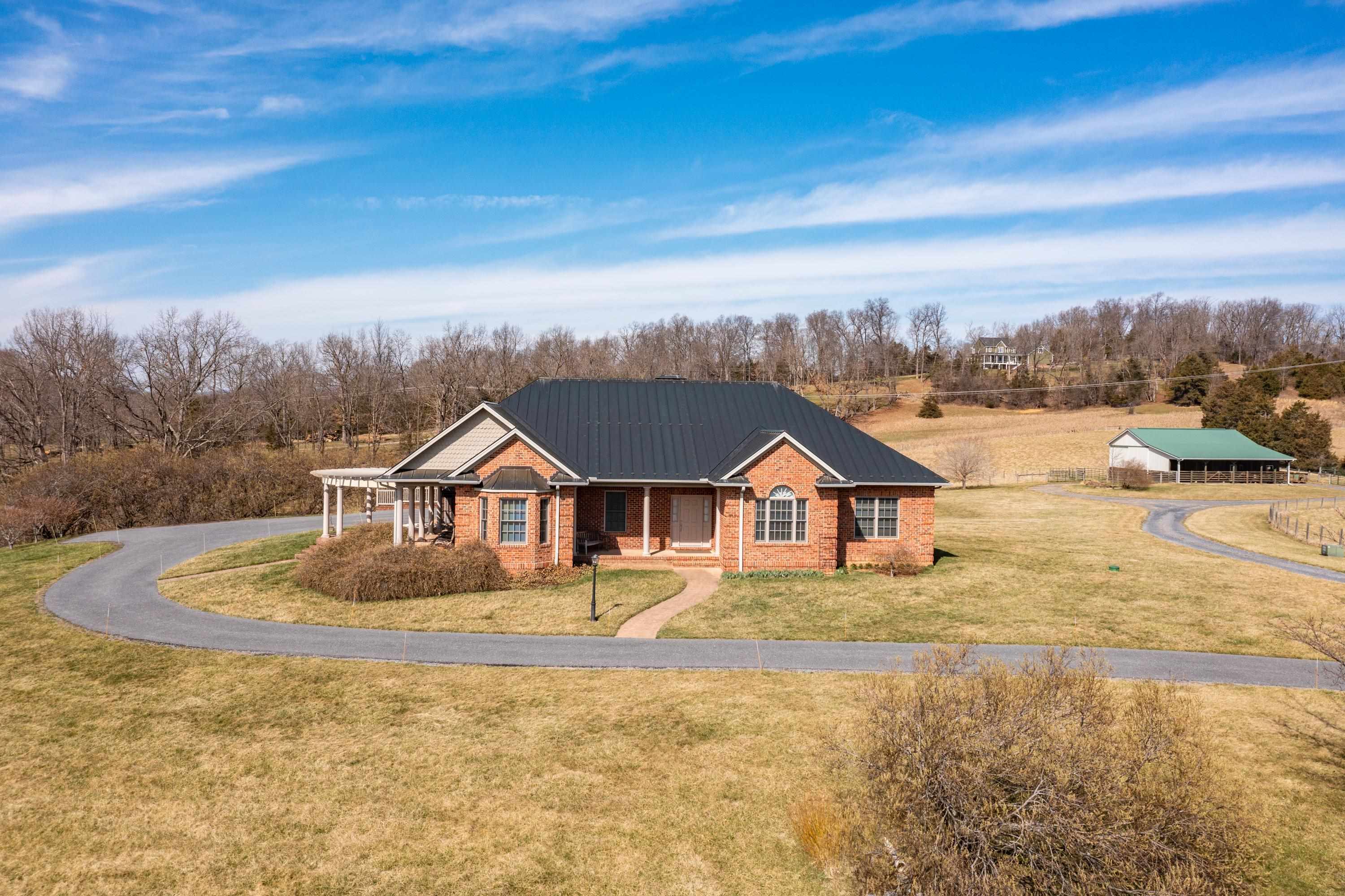 1465 Roman Road Mount Sidney, VA 24467 - Photo 3 of 45 a front view of a house with a yard