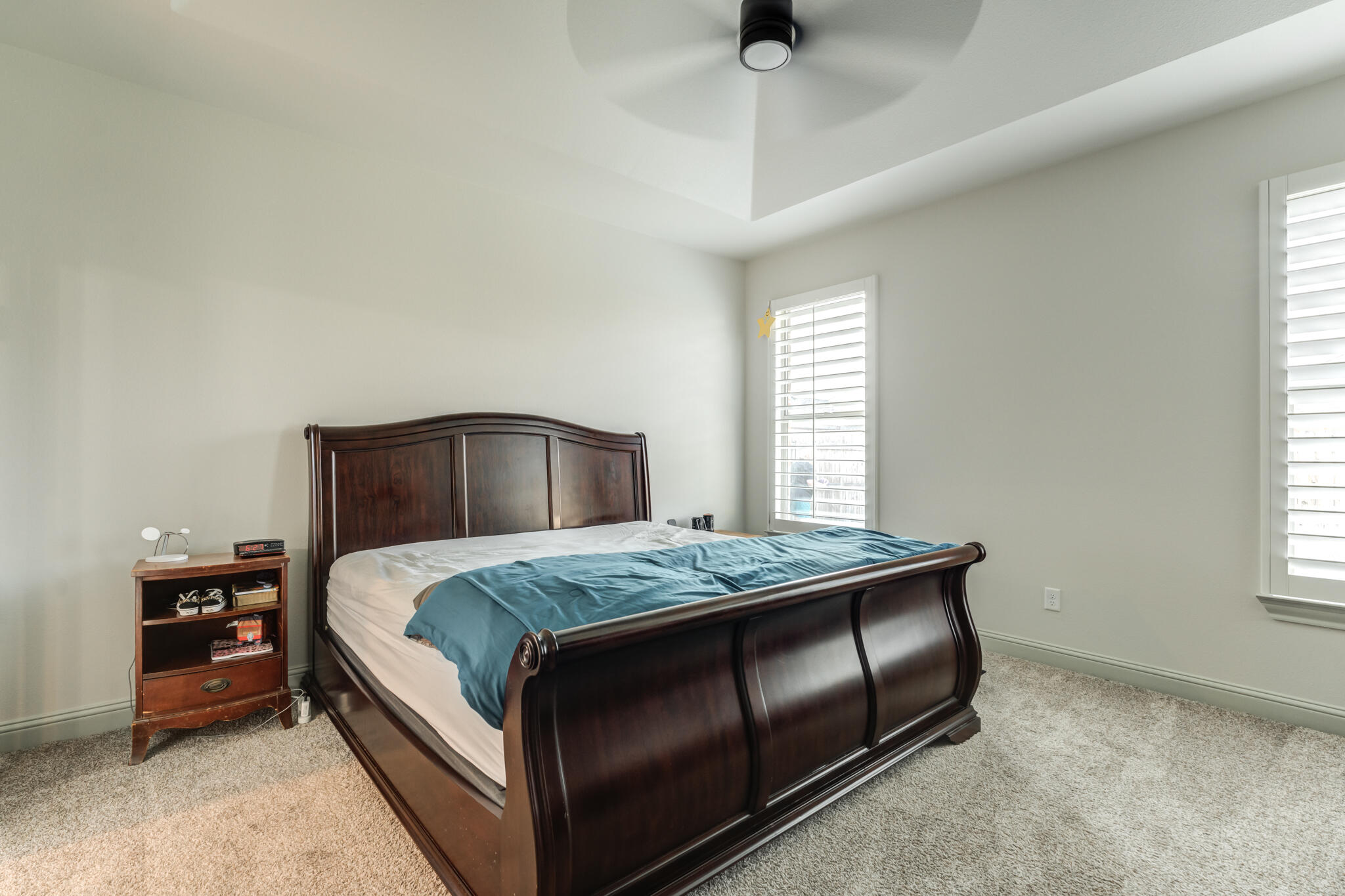 5722 118th Street Lubbock, TX 79424 - Photo 16 of 30 a bedroom with a bed and a window