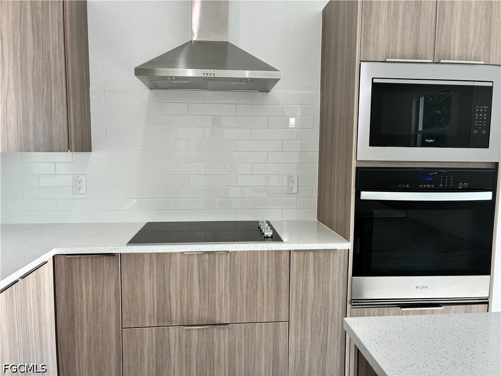 2022 Granada Road LaBelle, FL 33935 - Photo 12 of 43 a kitchen with a sink and a microwave