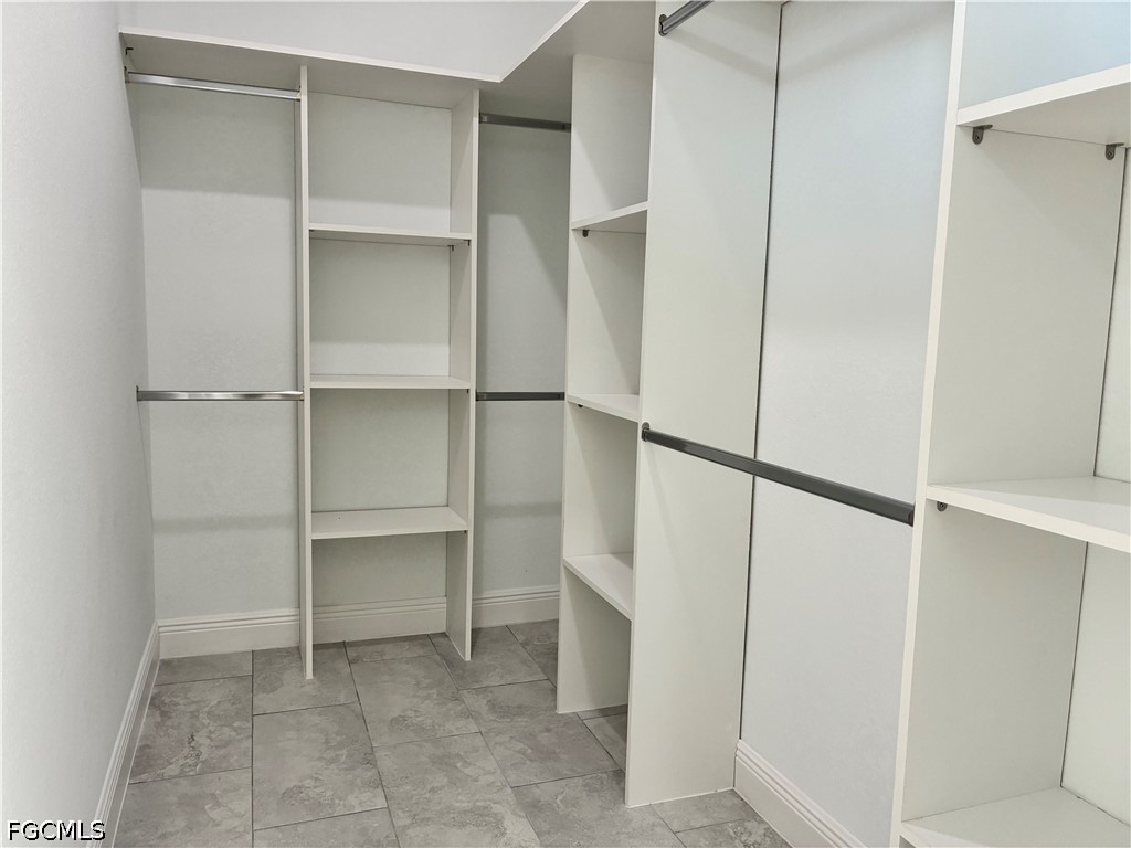 2022 Granada Road LaBelle, FL 33935 - Photo 19 of 43 a view of an empty walk in closet