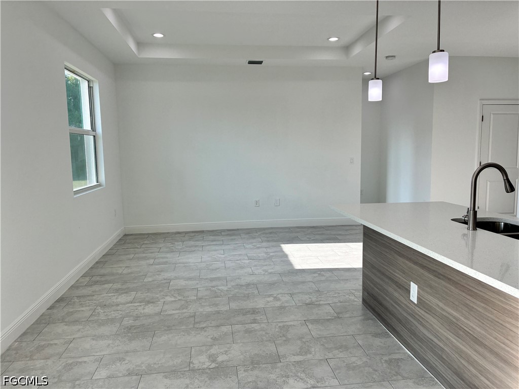 2022 Granada Road LaBelle, FL 33935 - Photo 23 of 43 wooden floor in an empty room with a window