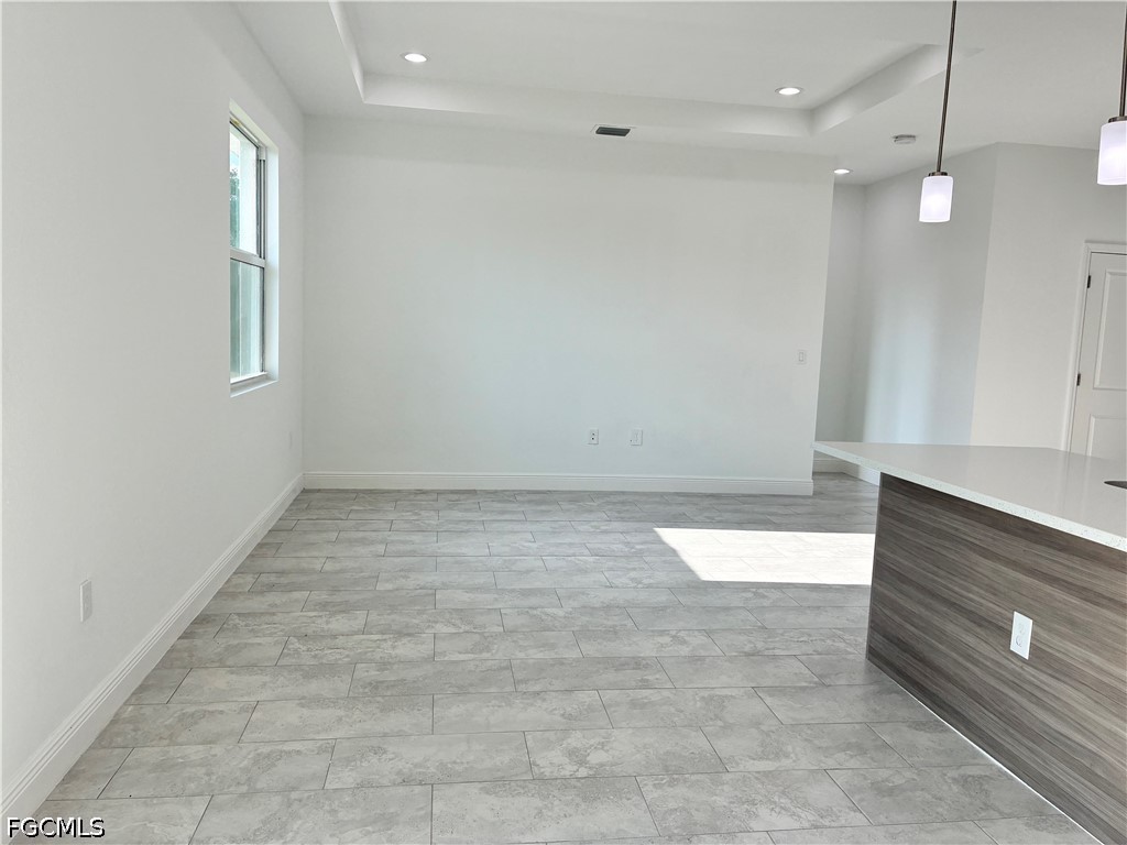 2022 Granada Road LaBelle, FL 33935 - Photo 25 of 43 an empty room with wooden floor and windows