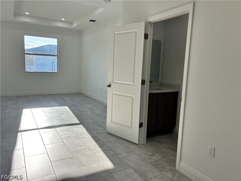 2022 Granada Road LaBelle, FL 33935 - Photo 28 of 43 wooden floor with window in an empty room