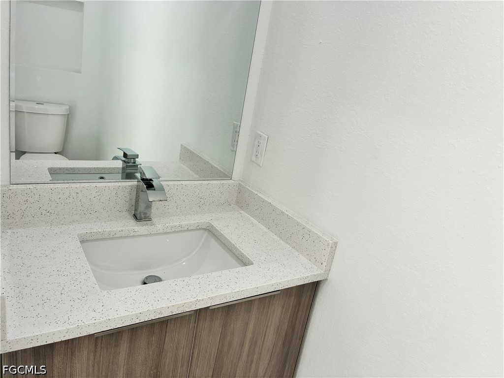 2022 Granada Road LaBelle, FL 33935 - Photo 29 of 43 a bathroom with a sink and toilet