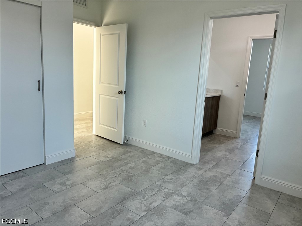 2022 Granada Road LaBelle, FL 33935 - Photo 37 of 43 an empty room with windows