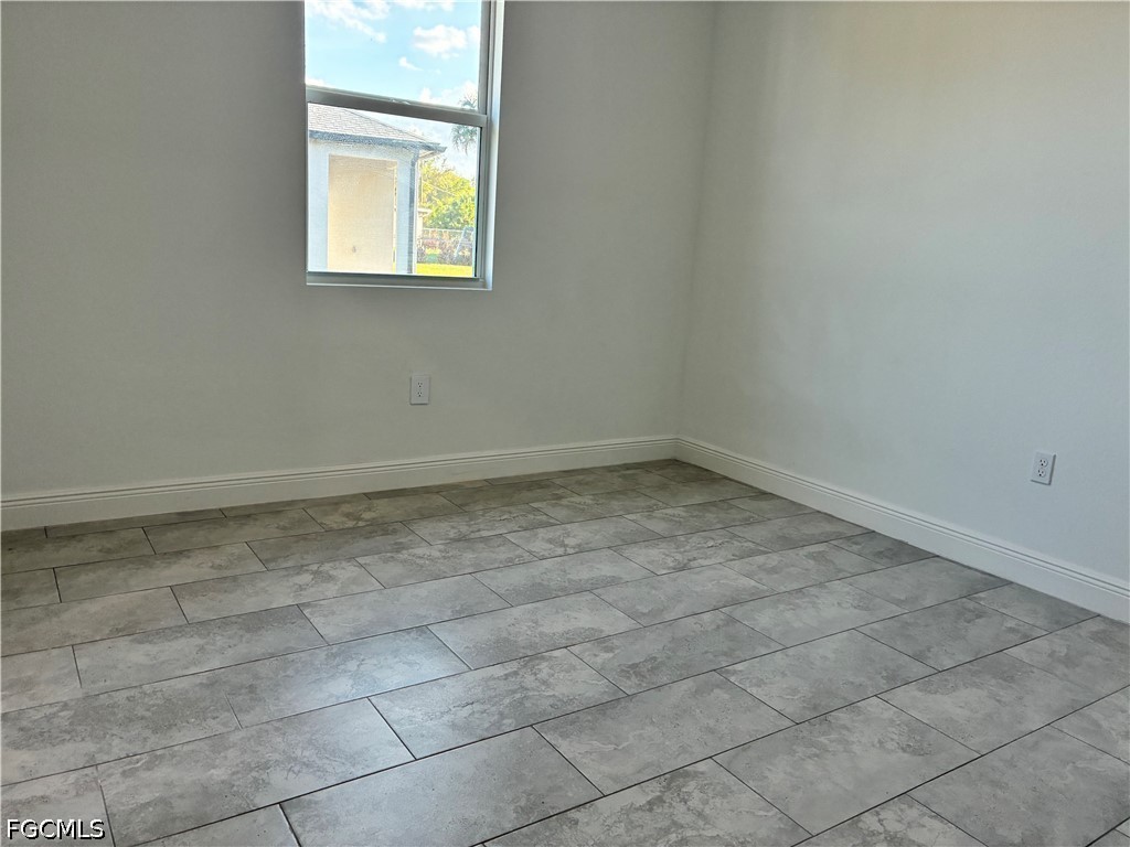 2022 Granada Road LaBelle, FL 33935 - Photo 39 of 43 a view of an empty room with a window