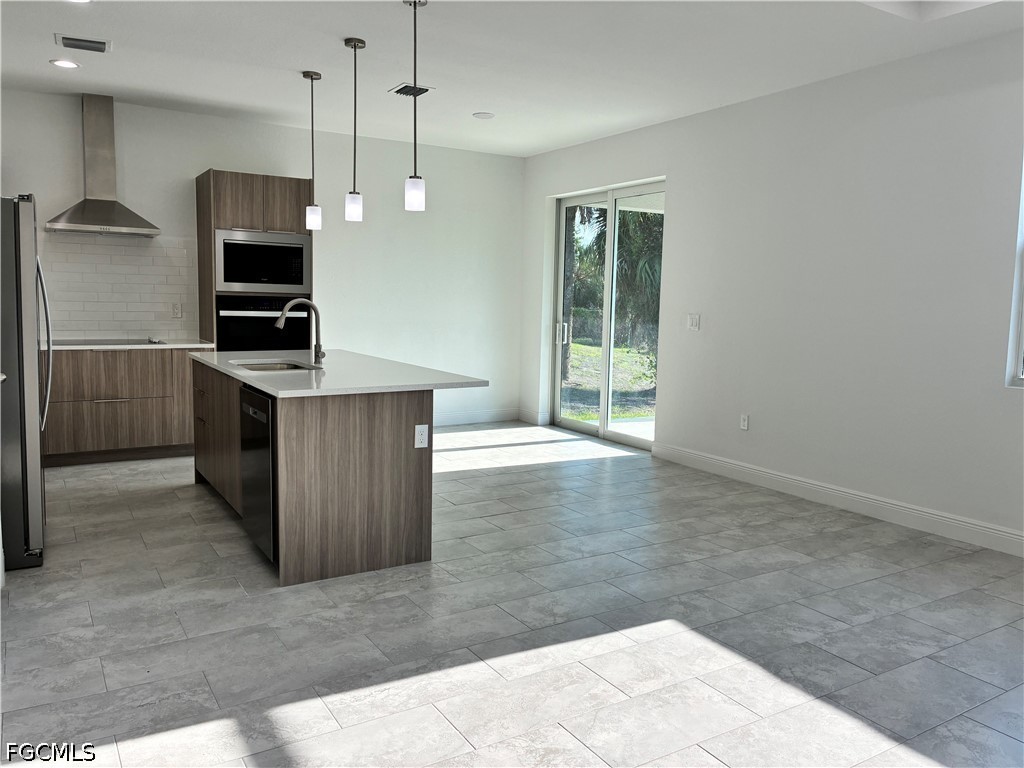 2022 Granada Road LaBelle, FL 33935 - Photo 8 of 43 a view of kitchen with sink and refrigerator