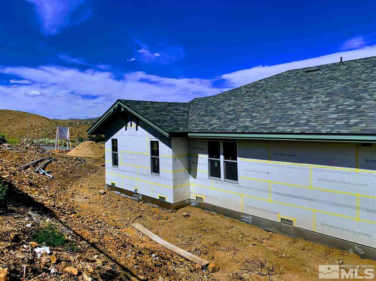 750 Harris Road Reno, NV 89506 - Photo 7 of 16 a backyard of a house with a yard
