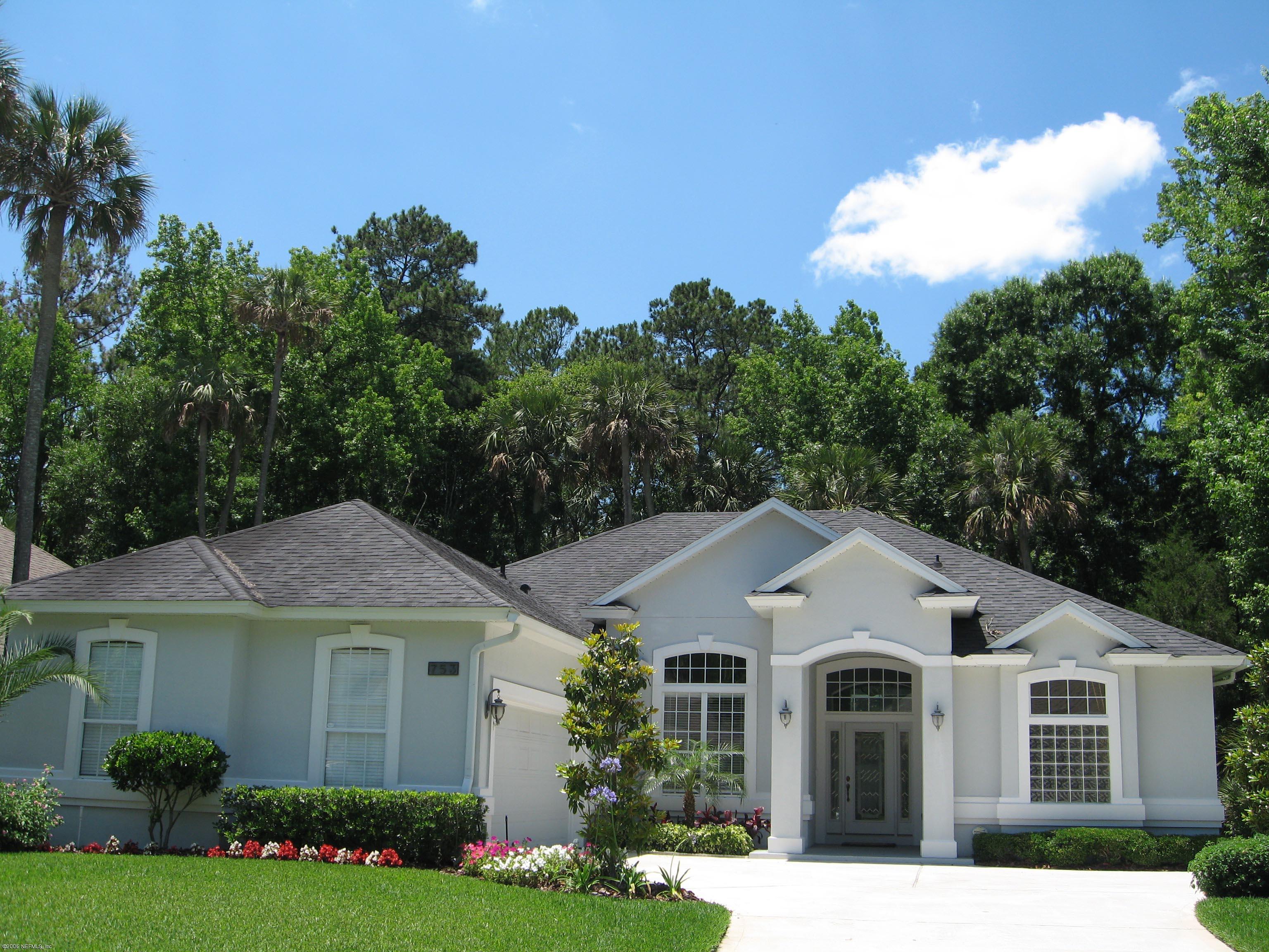 753 Mill Stream Road Ponte Vedra Beach, FL 32082 - Photo 1 of 16 a front view of a house with a yard