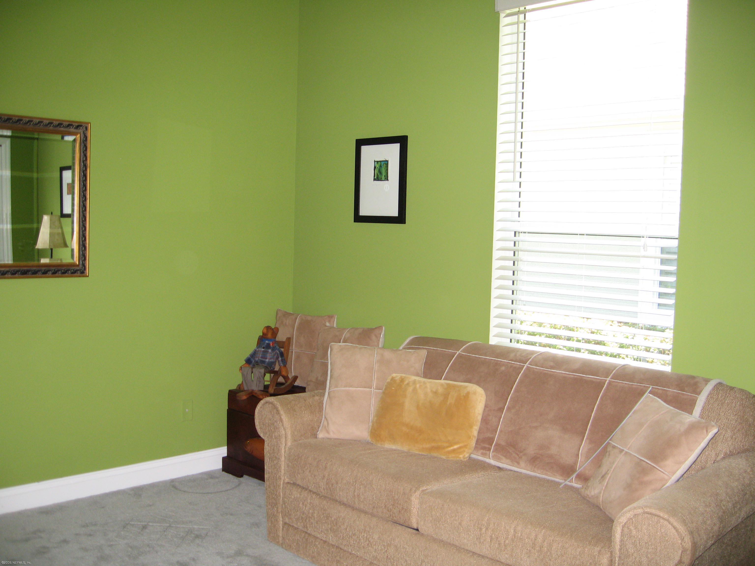 753 Mill Stream Road Ponte Vedra Beach, FL 32082 - Photo 12 of 16 a living room with furniture and a window