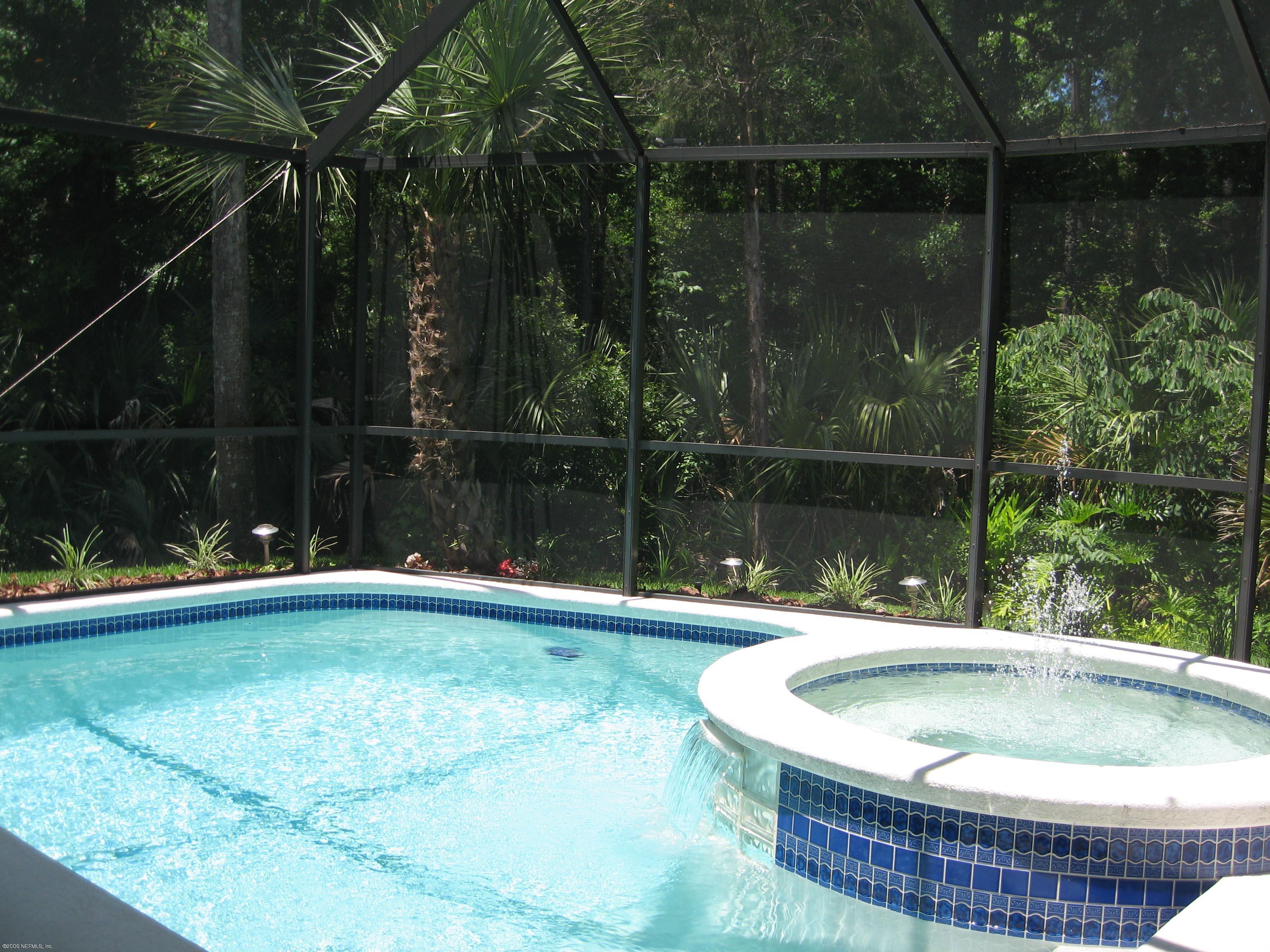 753 Mill Stream Road Ponte Vedra Beach, FL 32082 - Photo 14 of 16 a small pool with a bench in patio