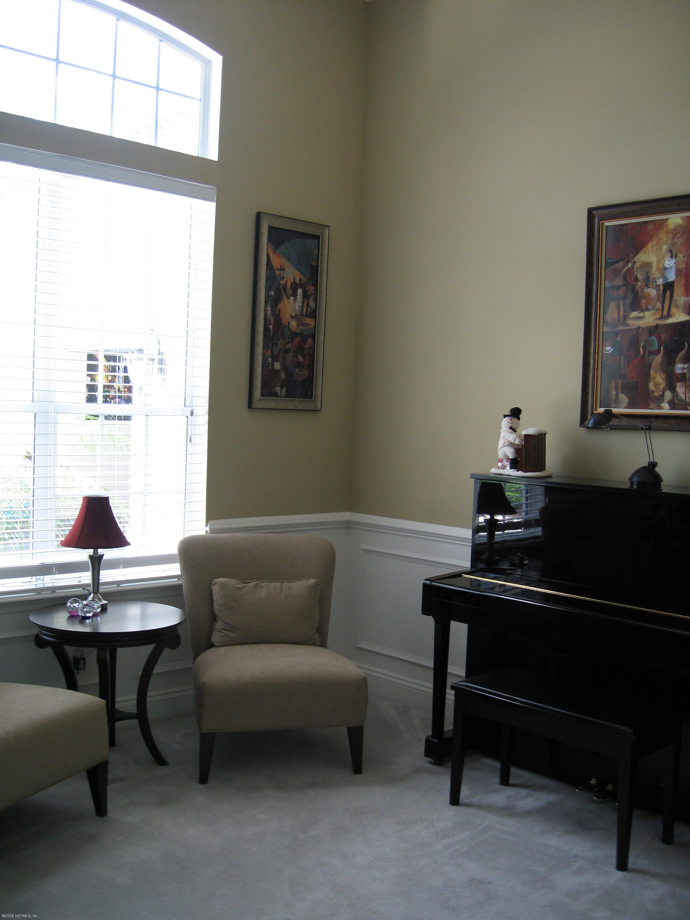 753 Mill Stream Road Ponte Vedra Beach, FL 32082 - Photo 3 of 16 a living room with furniture and a window