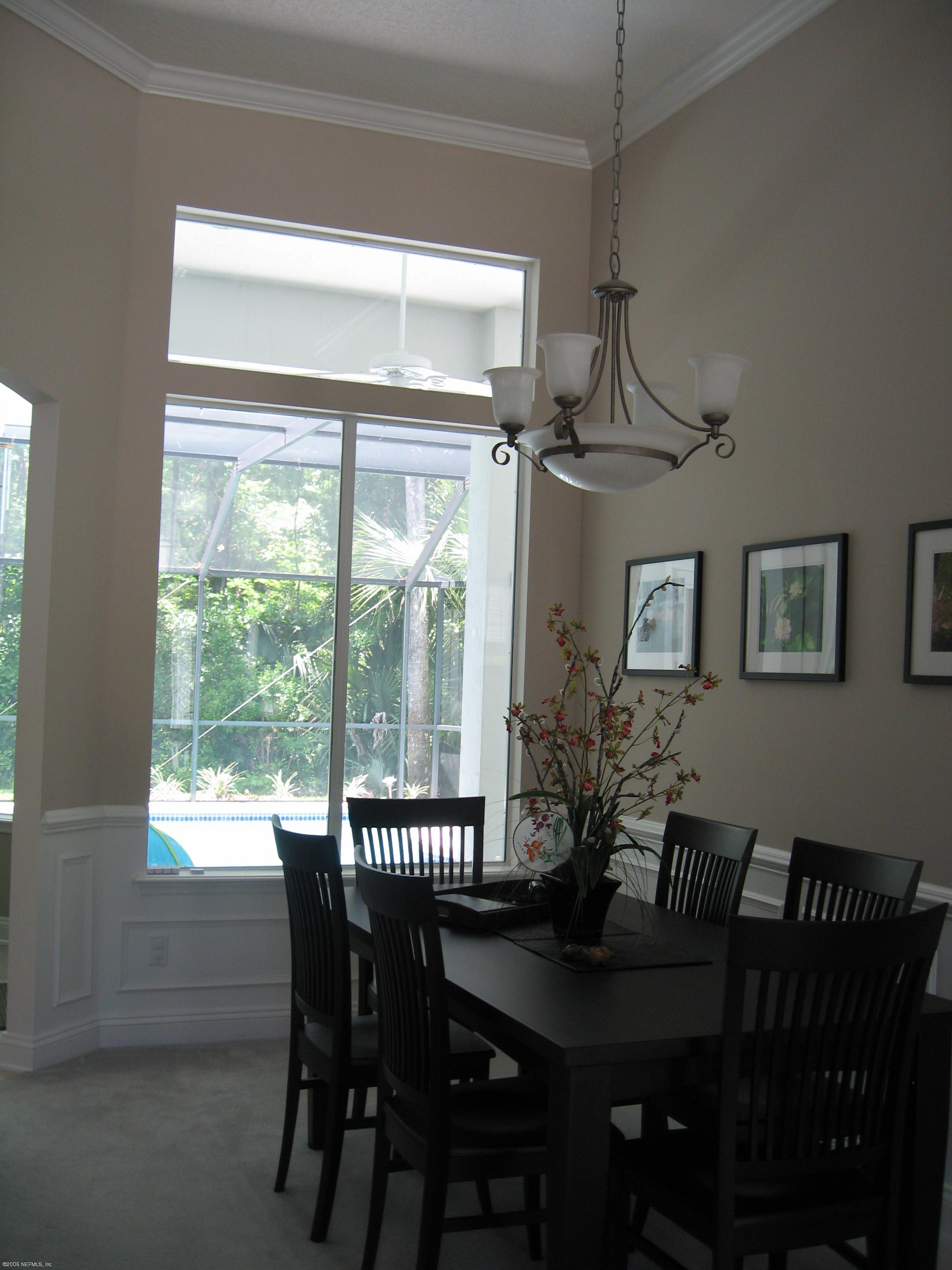 753 Mill Stream Road Ponte Vedra Beach, FL 32082 - Photo 4 of 16 a view of a dining room with furniture window and outside view